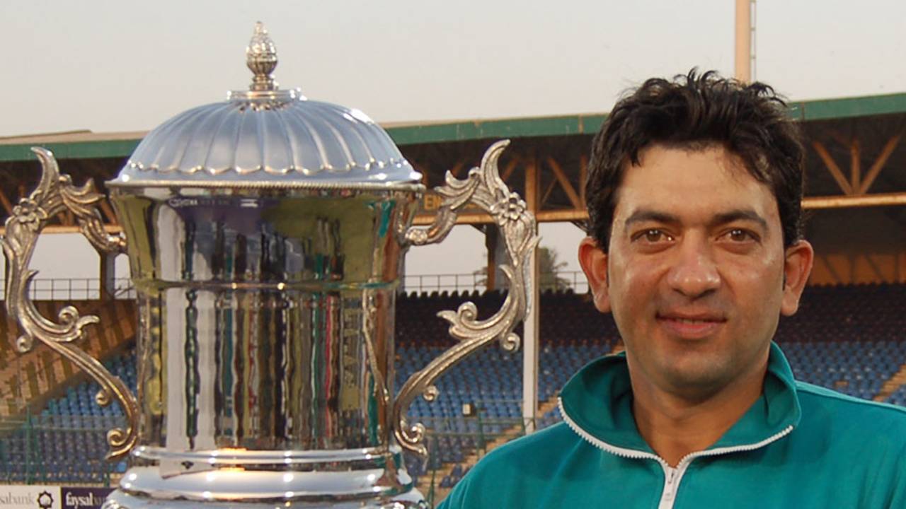 Hasan Raza, the HBL captain, poses with the winner's trophy
