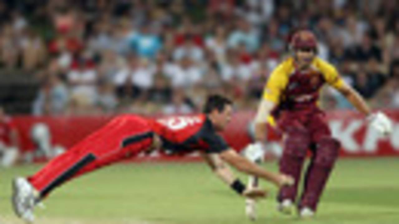 Daniel Christian dives to field one off his own bowling, South Australia v Queensland, Twenty20 Big Bash 2010-11, Adelaide, January 20, 2011