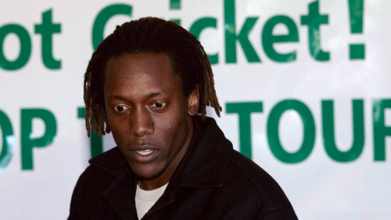 Henry Olonga speaks against New Zealand's tour of Zimbabwe at a press conference , Christchurch, July 12, 2005