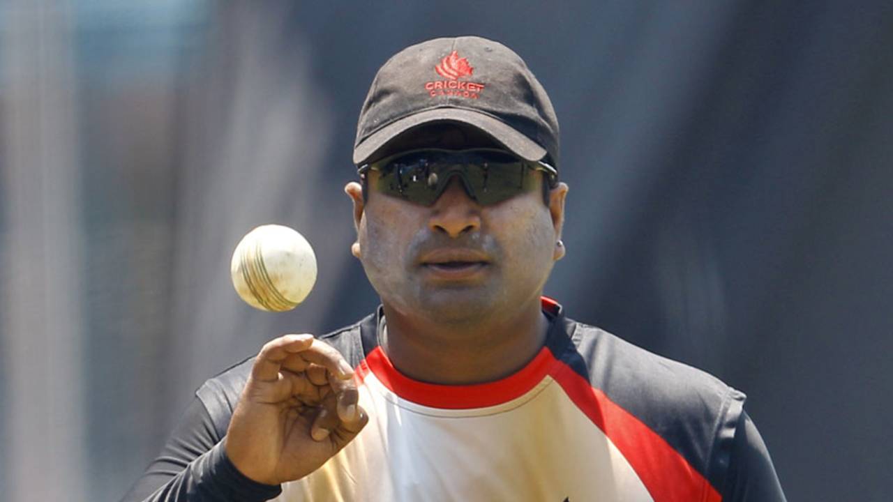 Balaji Rao gets ready to bowl during Canada's training session, Bangalore, March 15, 2011