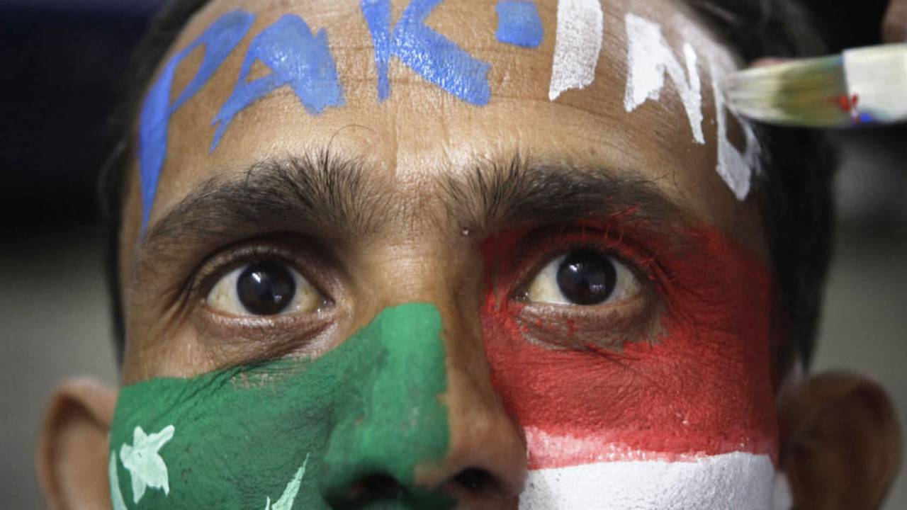 A fan gets his face painted a day ahead of the India-Pakistan match, Guwahati, World Cup, March 29, 2011