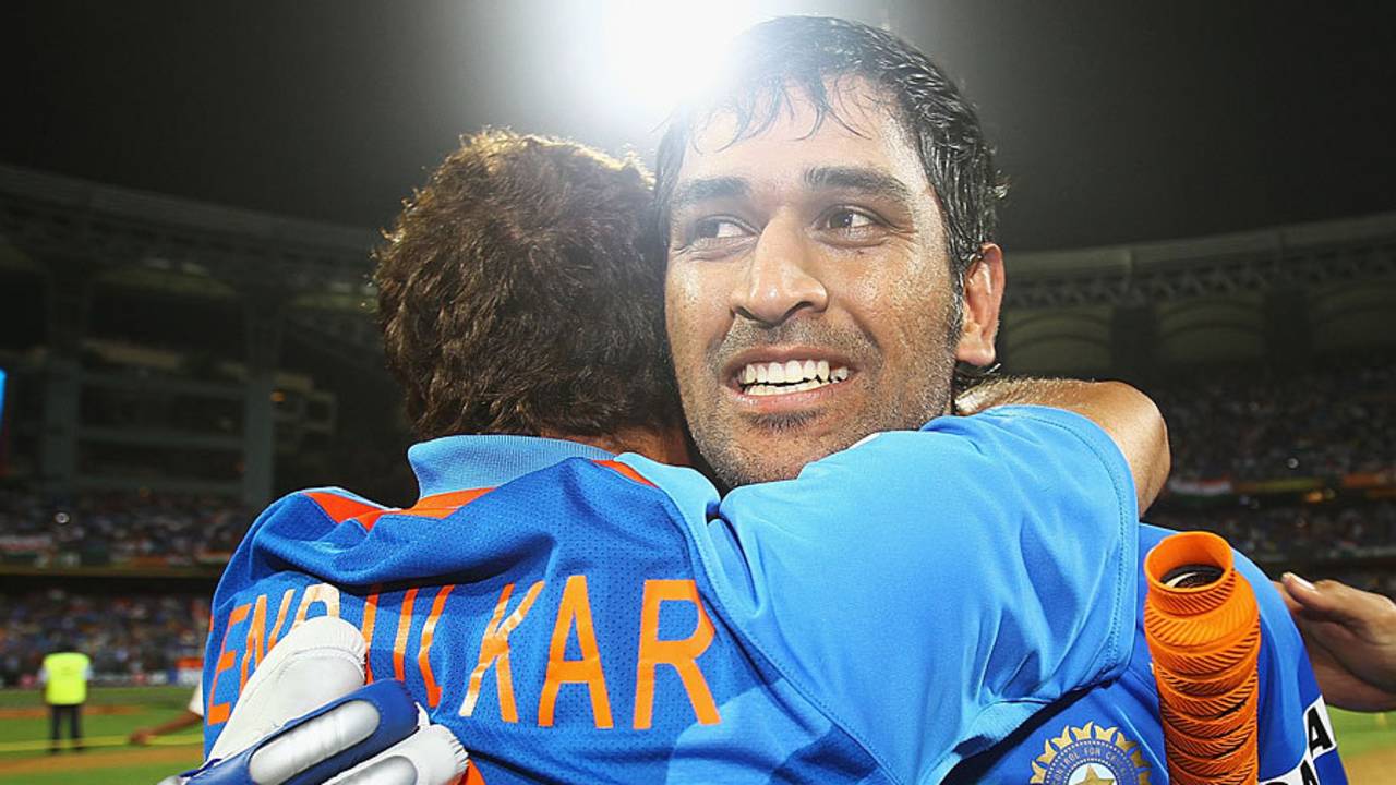 An emotional MS Dhoni is hugged by Sachin Tendulkar after India's victory&nbsp;&nbsp;&bull;&nbsp;&nbsp;Getty Images