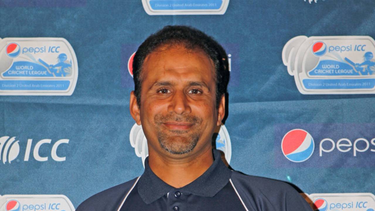 Hong Kong captain Najeeb Amar holds the ICC World Cricket League Division 2 Trophy, Dubai, 7th April 2011