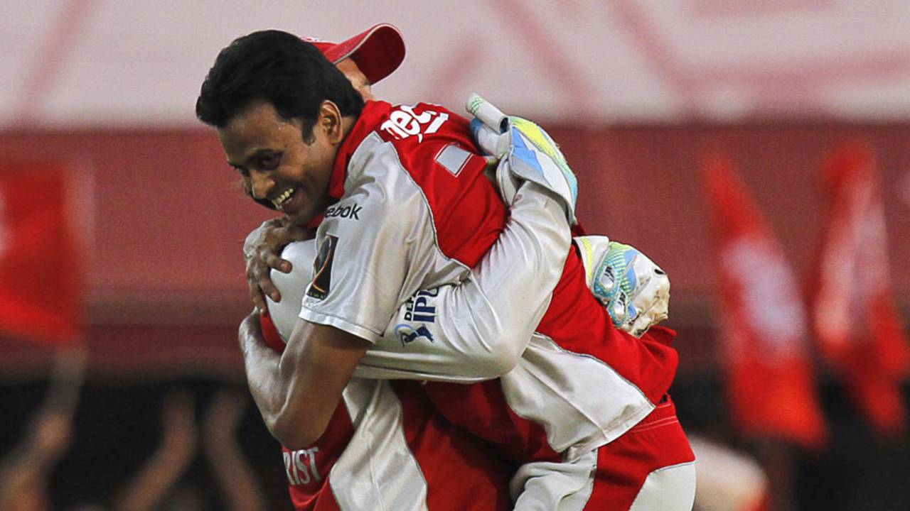 Shalabh Srivastava hugs Adam Gilchrist after dismissing David Warner, Kings XI Punjab v Delhi Daredevils, IPL 2011, Dharamsala, May 15, 2011