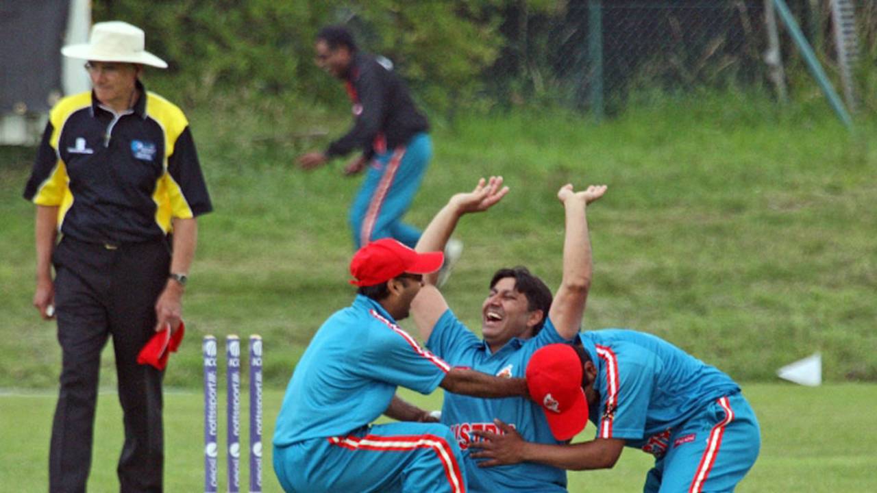 Muhammad Akhtar is ecstatic after snagging a wicket
