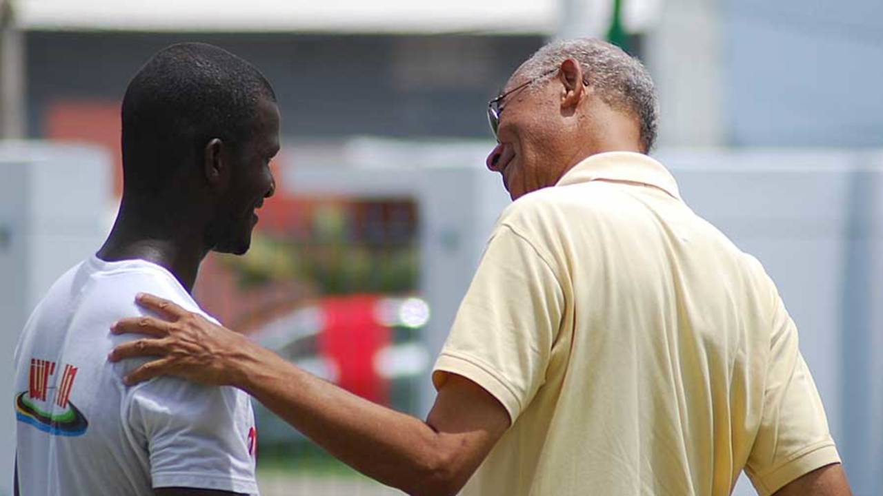 Darren Sammy and Rudi Webster have a word, Barbados, June 26, 2011