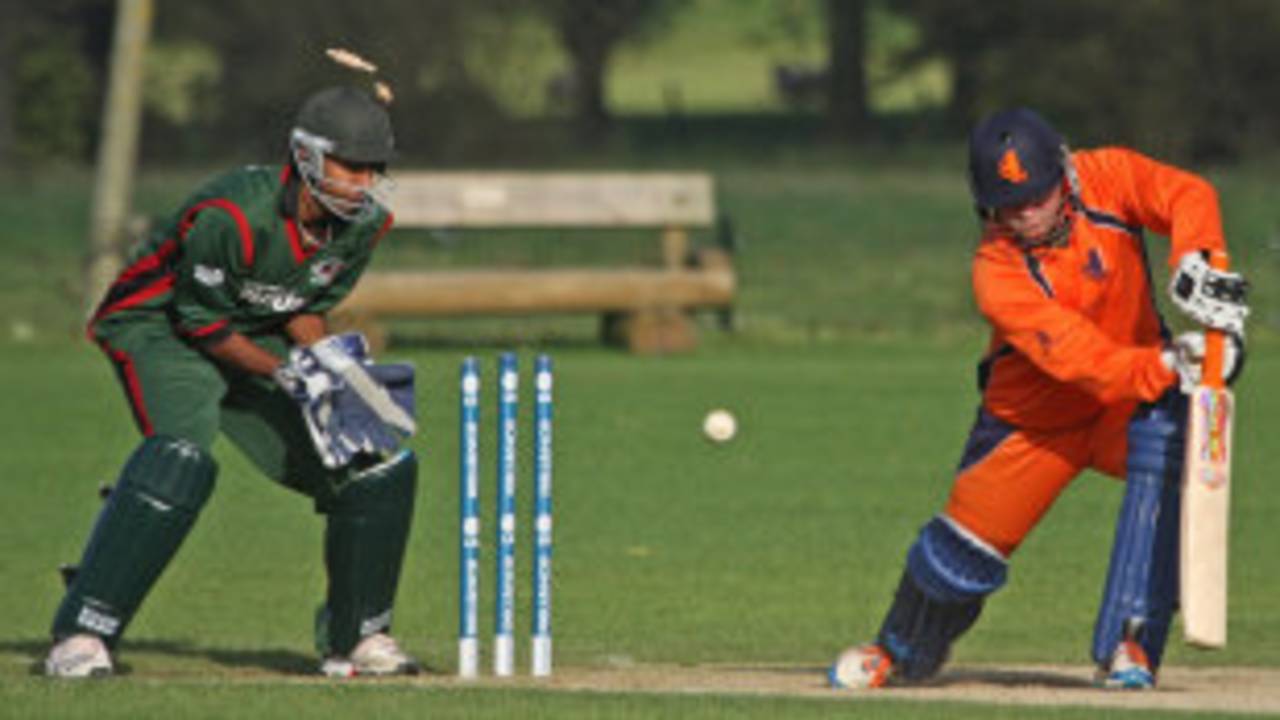 Tom de Grooth is bowled by Duncan Allan for 22, Netherlands v Kenya, Voorburg, September 12, 2011
