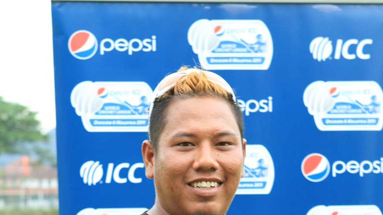 Malaysia's Eszrafiq Aziz with his Man-of-the-Match award after taking 5 for 36, Malaysia v Fiji, World Cricket League Division Six, Kinrara Academy Oval, September 20, 2011