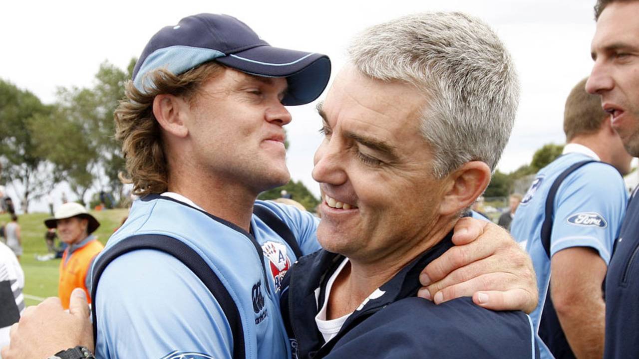 Lou Vincent hugs coach Paul Strang after Auckland's victory in the one-day final, Canterbury v Auckland, Christchurch, February 13, 2011