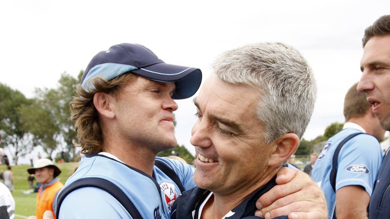 Lou Vincent hugs coach Paul Strang after Auckland's victory in the one-day final