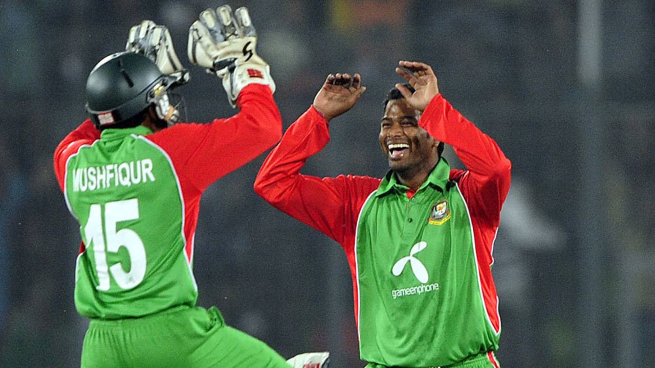 Mushfiqur Rahim and Alok Kapali celebrate another wicket, Bangladesh v Pakistan, only Twenty20, Mirpur, November 29, 2011