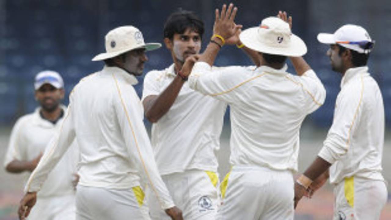 Tamil Nadu's J Kaushik celebrates a wicket, Tamil Nadu v Madhya Pradesh, Ranji Trophy Elite, Chennai, 3rd day, December 23, 2011
