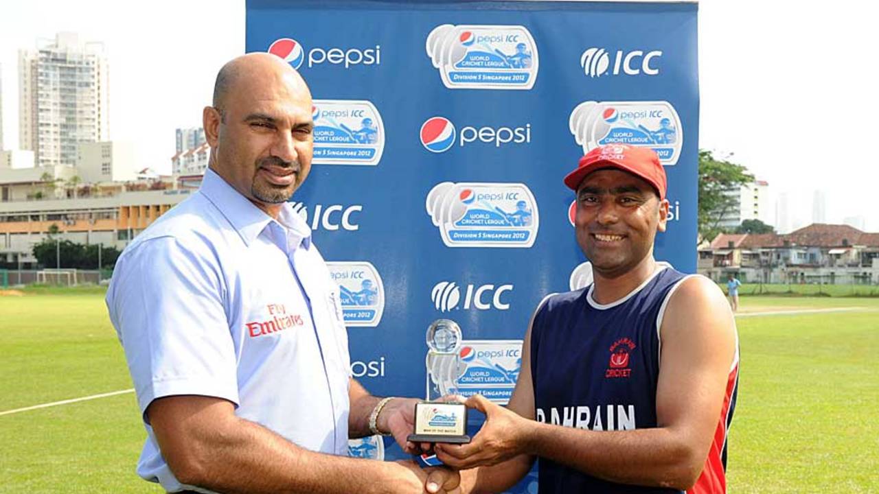 Bahrain's Rizwan Baig collects his Man-of-the-Match award, Malaysia v Bahrain, ICC World Cricket League Division Five, Singapore, February 24, 2012
