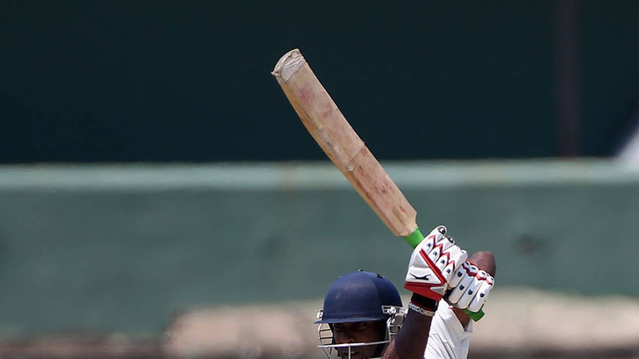 Chamara Silva drives through the covers during his hundred