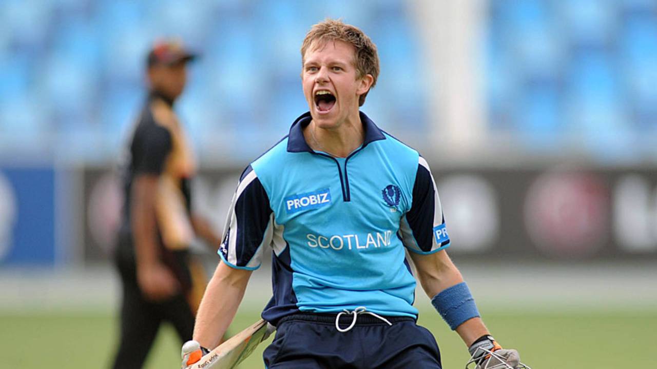 Ryan Flannigan roars after getting Scotland the last-ball four they needed against Canada