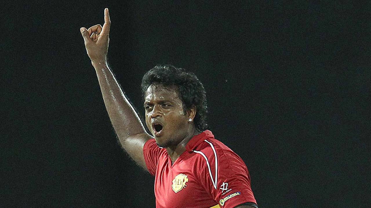 Dilhara Fernando celebrates his five-wicket haul for Uva