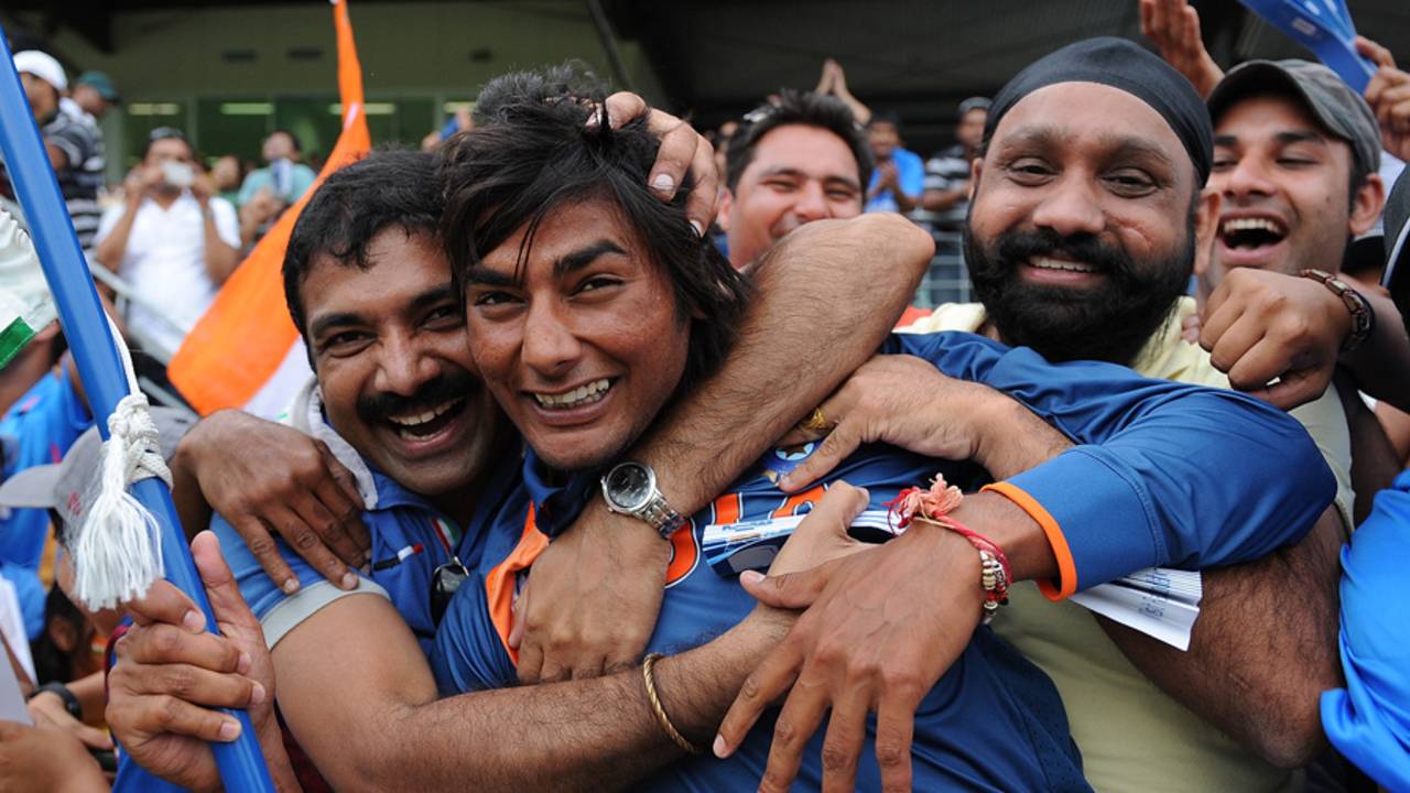Kamal Passi celebrates the win with some Indian fans