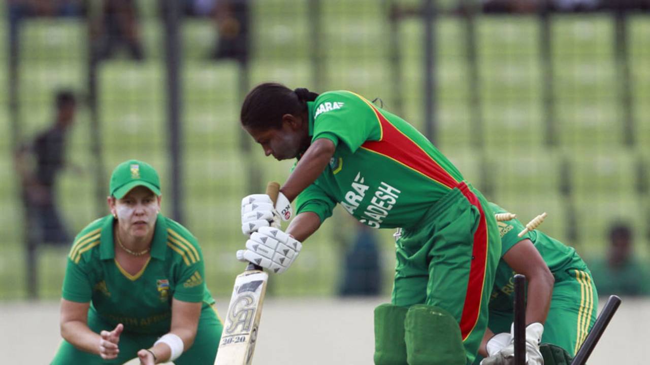 Bangladesh's Tazia Akhter has her middle-stump pegged back