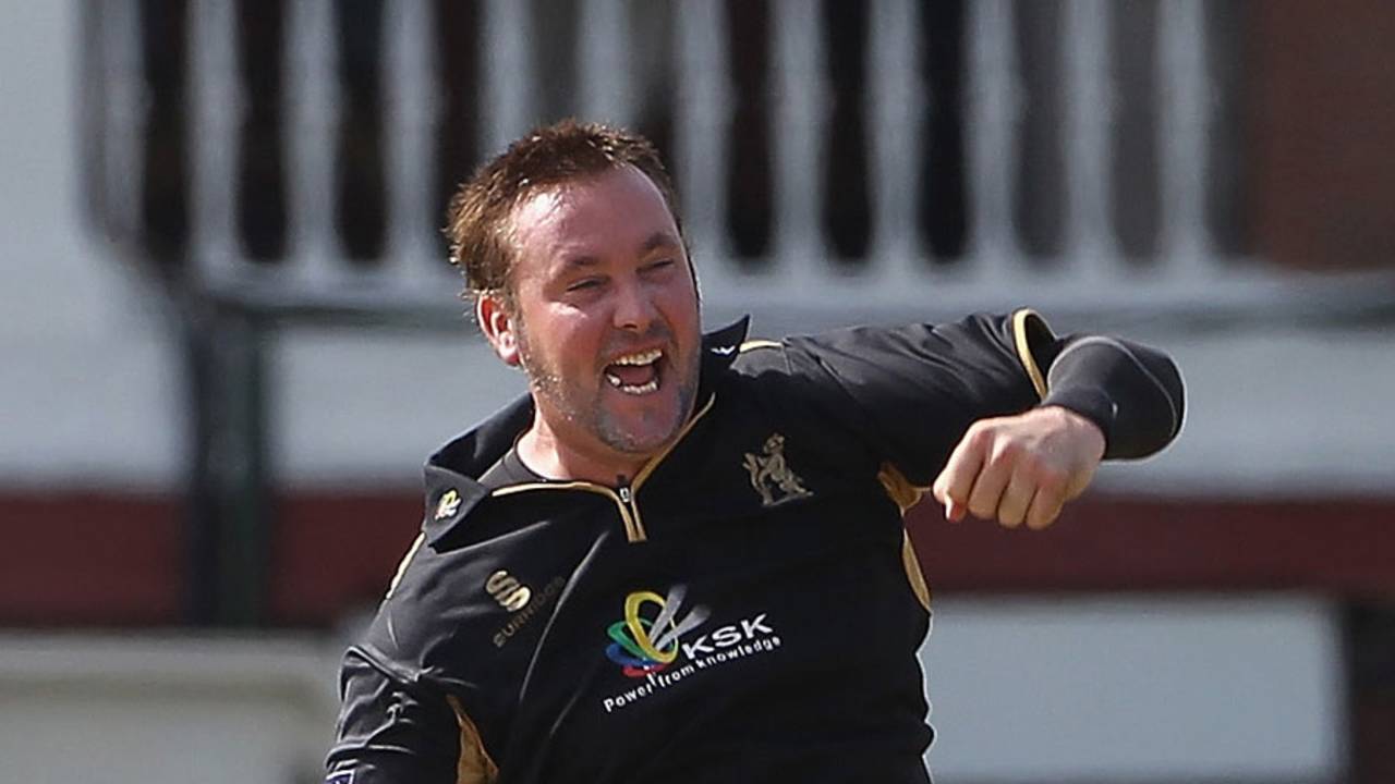 Ian Blackwell celebrates the wicket of Neil McKenzie