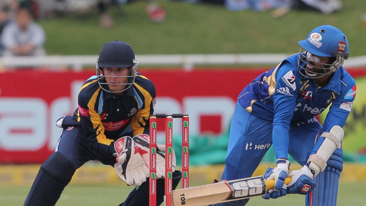 Dinesh Karthik reverse-sweeps, Mumbai Indians v Yorkshire, Group B, Champions League T20, Cape Town, October 18, 2012