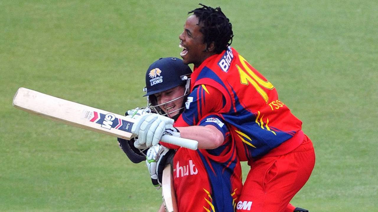 Jean Symes and Thami Tsolekile after the Lions' victory, Lions v Yorkshire, Champions League T20, Group B, Johannesburg, October 20, 2012