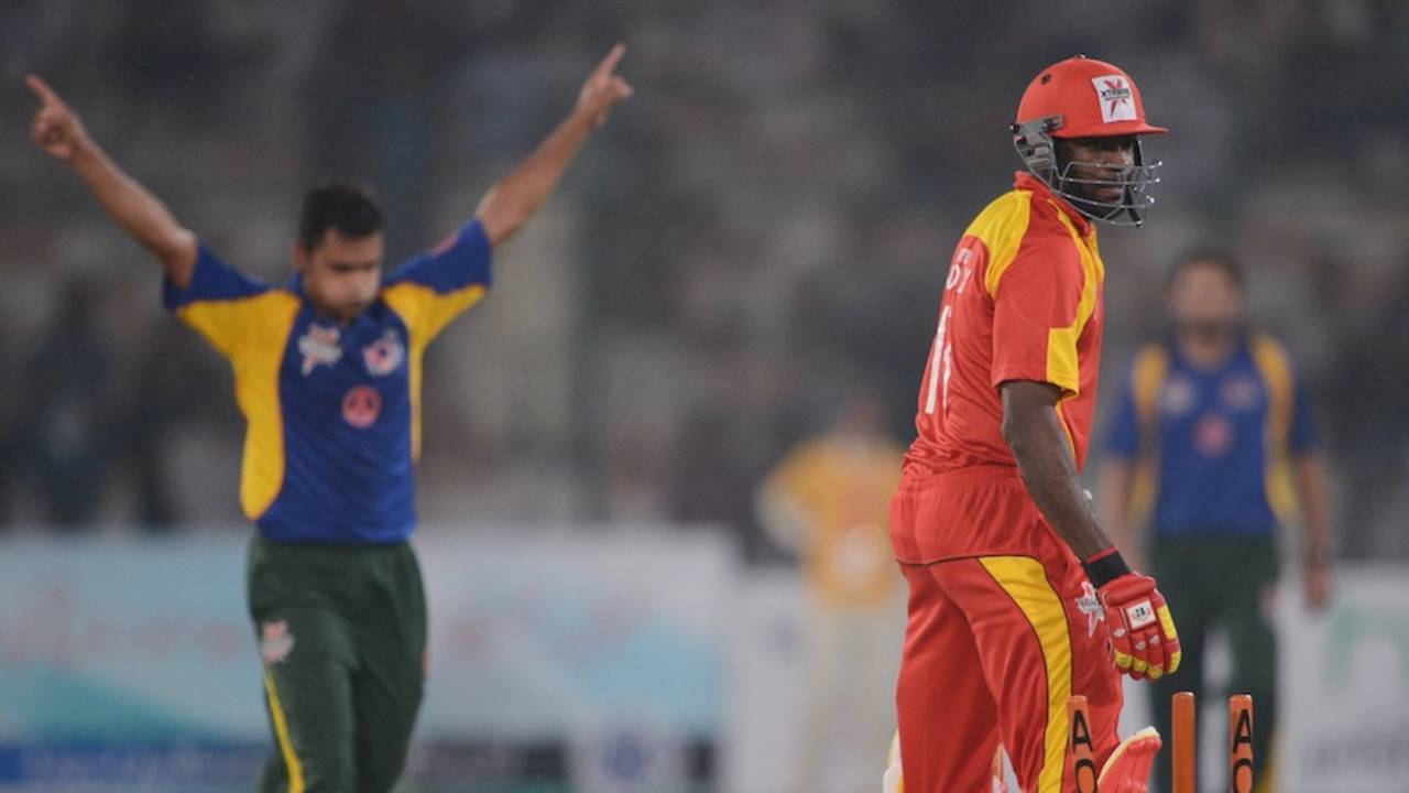 Tabish Khan celebrates his second wicket