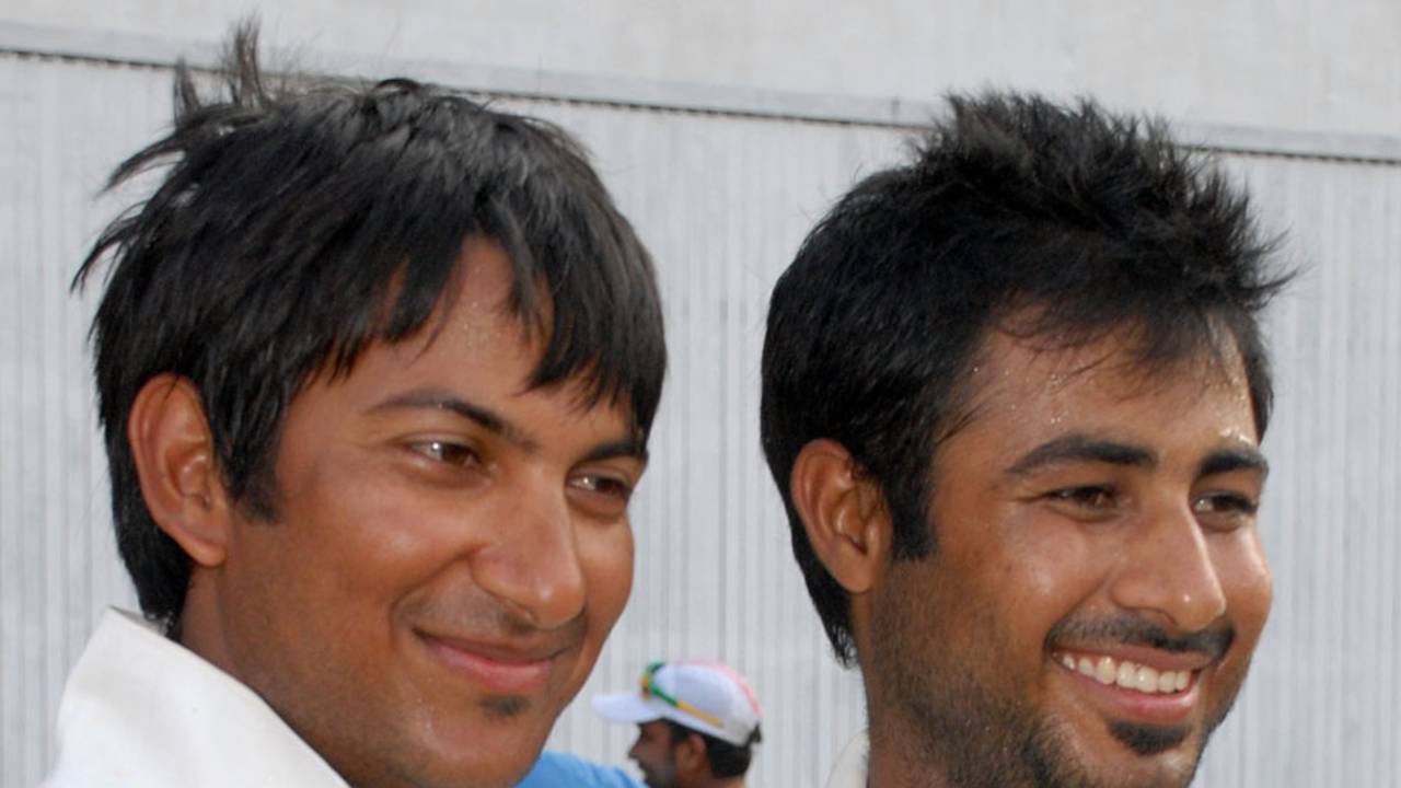 Iresh Saxena and Anustup Majumdar smile after East Zone's Duleep Trophy win