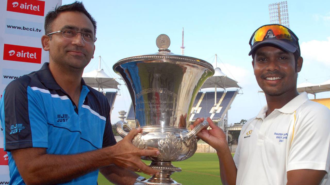 East Zone captain Natraj Behera lifts the Duleep Trophy handed over by Saba Karim