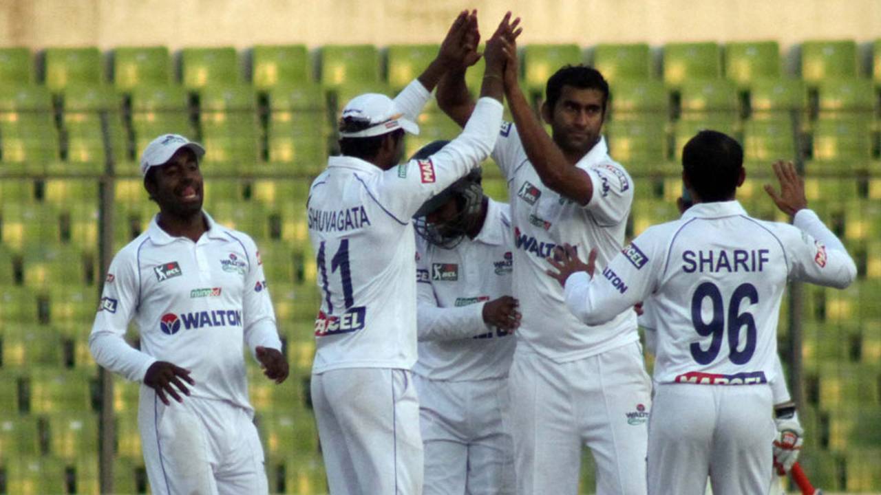 Central Zone's Mosharraf Hossain celebrates a wicket with his team-mates, Central Zone v North Zone, BCL final, Mirpur, 2nd day, February 23, 2013