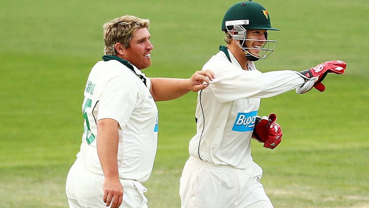 Mark Cosgrove and Tim Paine celebrate a wicket, Tasmania v Victoria, Sheffield Shield, Hobart, 2nd day, March 15, 2013