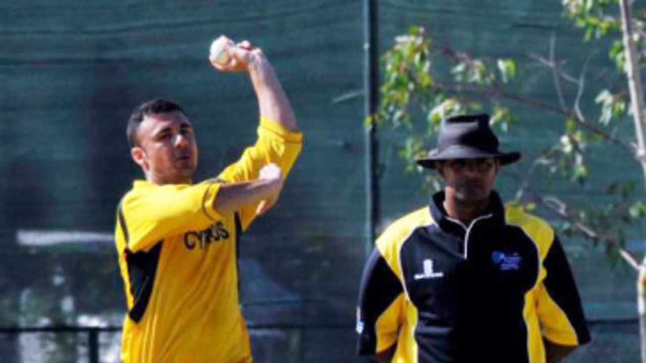 Cyprus national team captain Mike Kyriacou bowls