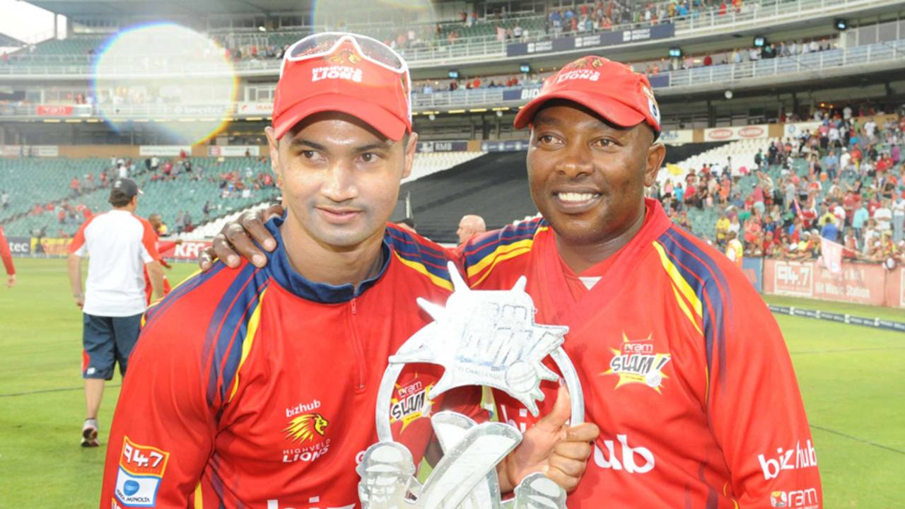 Lions captain Alviro Petersen and coach Geoff Toyana hold the Twenty20 trophy