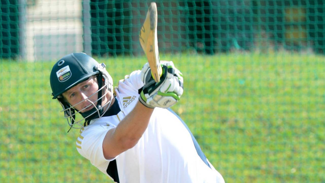 Andrew Birch clubs one during a South Africa Emerging Squad nets session, Pretoria, April 18, 2013
