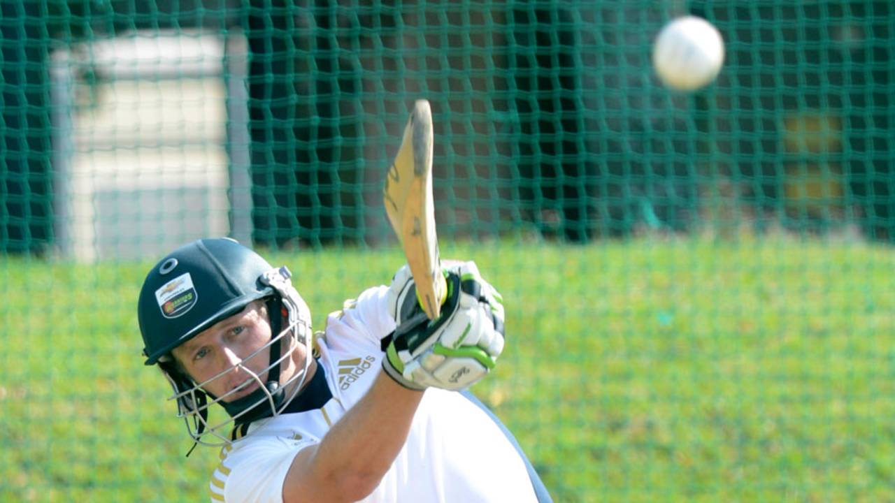 Andrew Birch clubs one during a South Africa Emerging Squad nets session, Pretoria, April 18, 2013