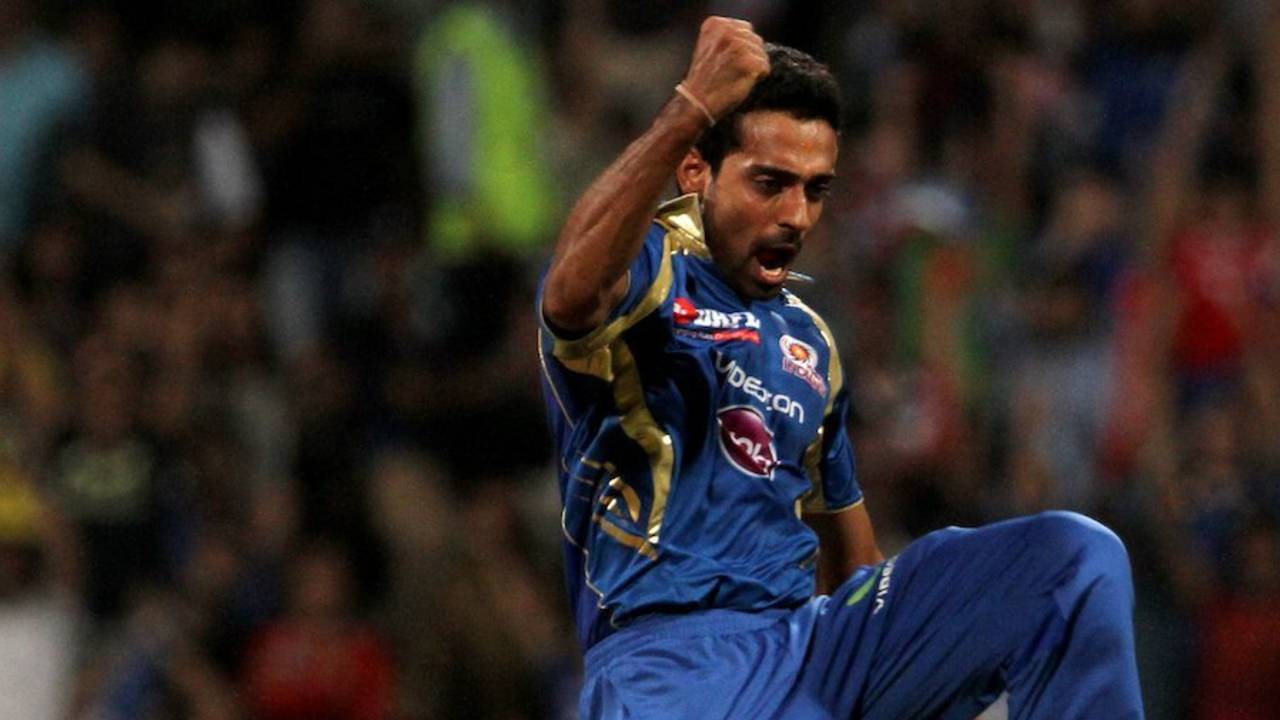 A jubilant Dhawal Kulkarni leaps in celebration, Mumbai Indians v Royal Challengers Bangalore, IPL, Mumbai, April 27, 2013