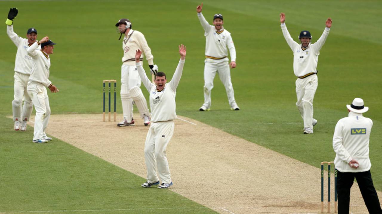 Ryan Buckley collects one of his five wickets on debut, Surrey v Durham, County Championship, Division One, The Oval, 1st day, May 10, 2012
