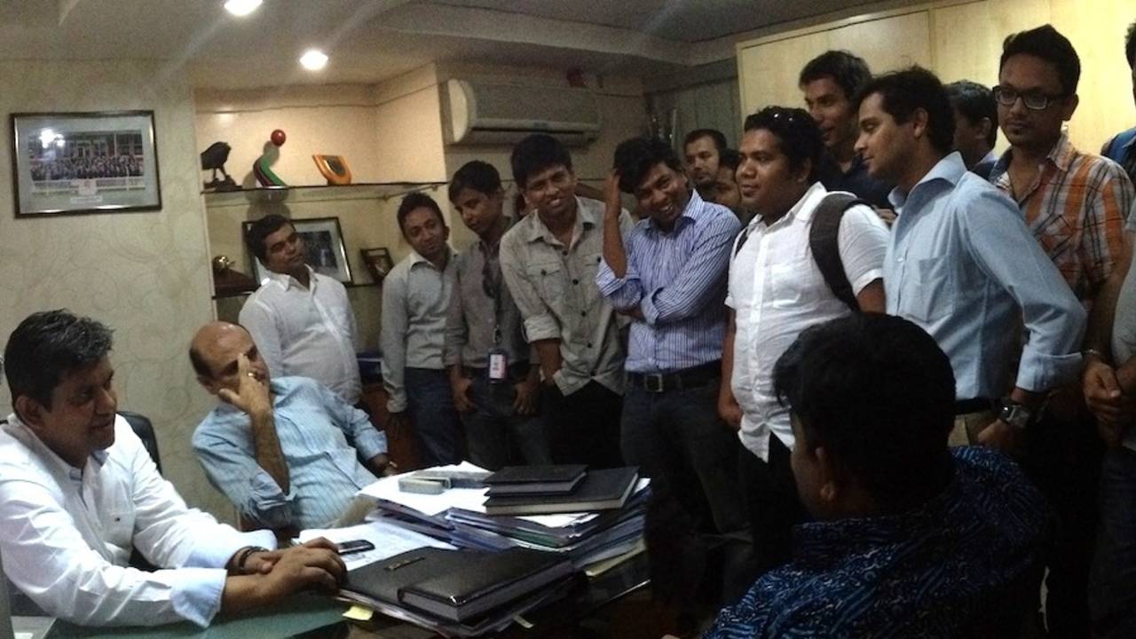 BCB interim committee member Jalal Yunus (right) explaining to the media that only the BCB president can make a statement regarding ACSU's investigation into alleged match and spot-fixing claims in the BPL. He is flanked by BCB's acting CEO  Nizamuddin Chowdhury whose office room was swarming with members of the Bangladesh media on Monday, June 3, 2013.
