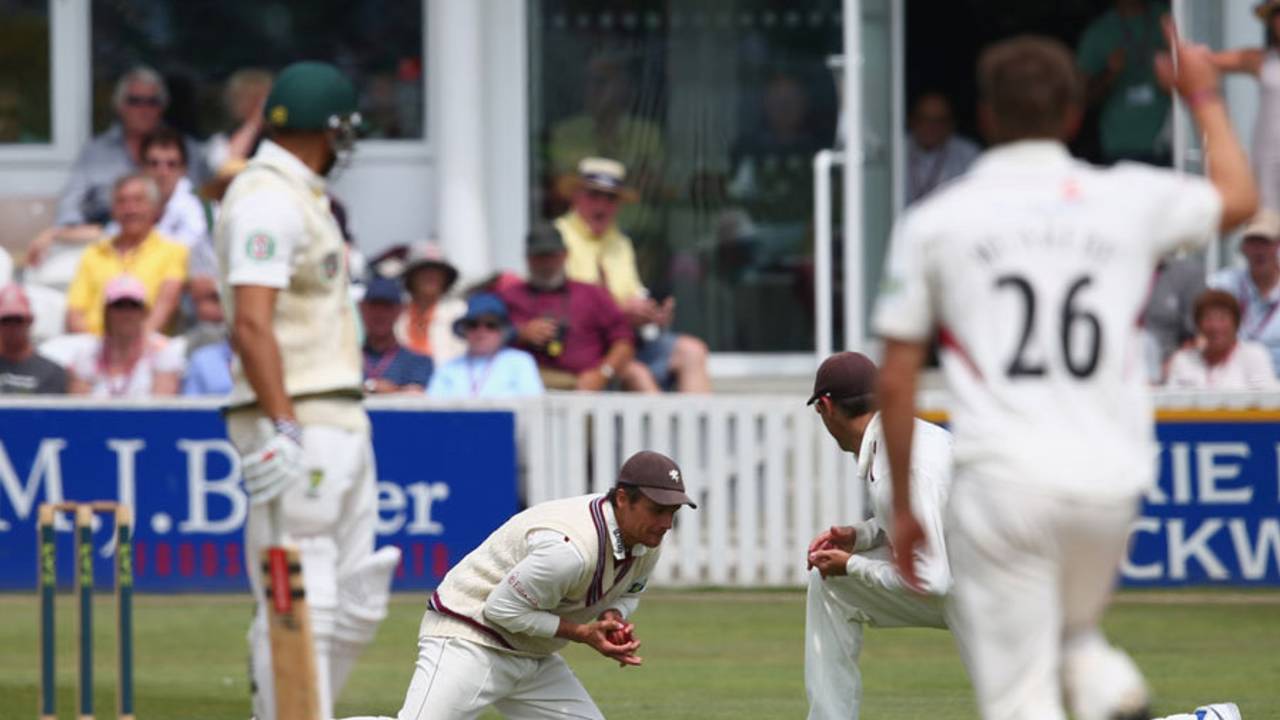 Usman Khawaja watches as James Hildreth catches his edge, Somerset v Australians, Taunton, 2nd day, June 27, 2013