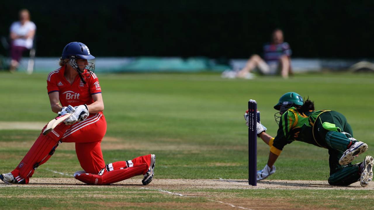 Susie Rowe looks on as Pakistan keeper Batool Fatima takes a catch, England v Pakistan, 1st women's T20, Loughborough, July 5, 2013