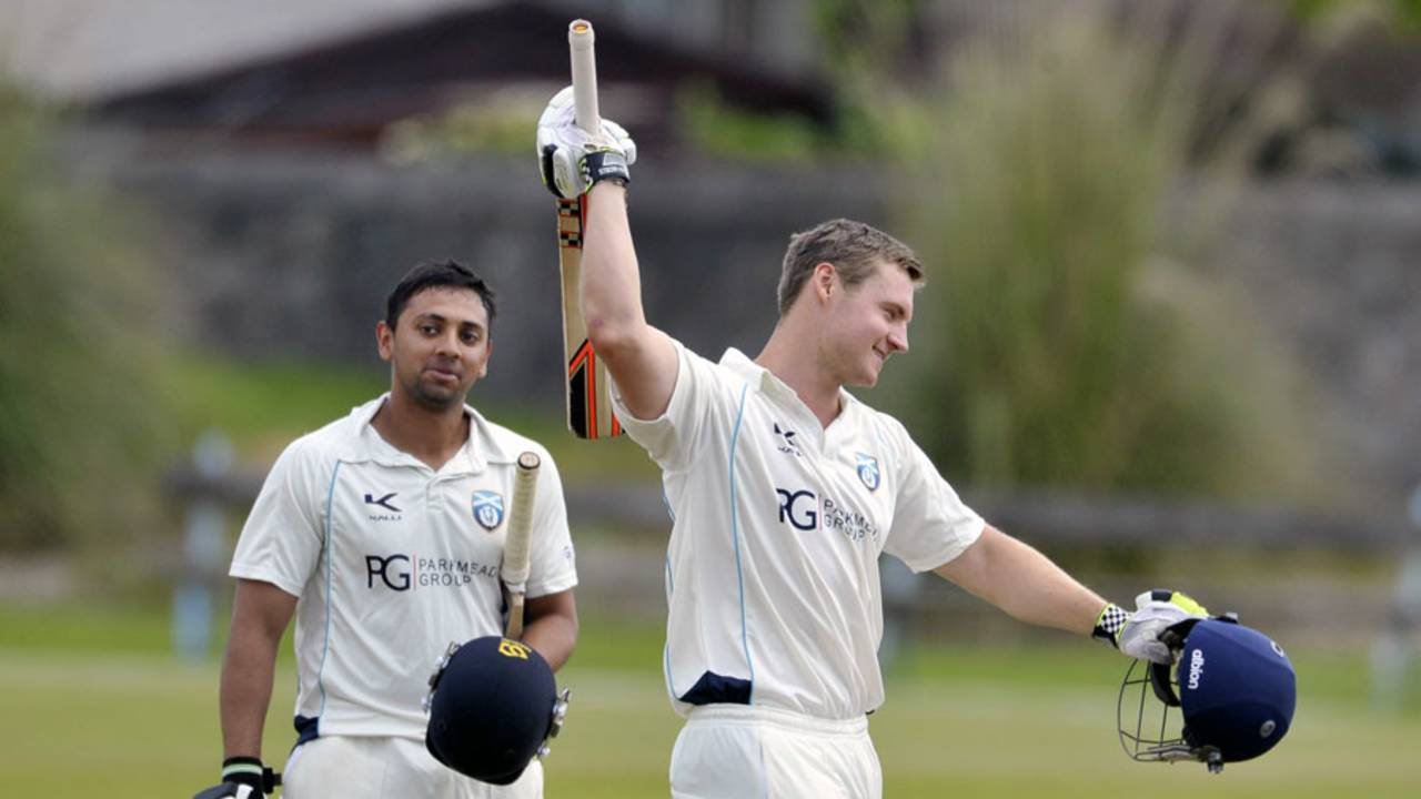 Ewan Chalmers celebrates his maiden first-class hundred