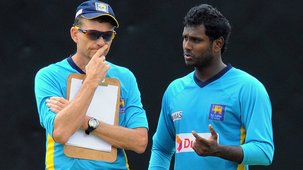 Angelo Mathews talks to coach Graham Ford during a practice session, Pallekele, July 25, 2013