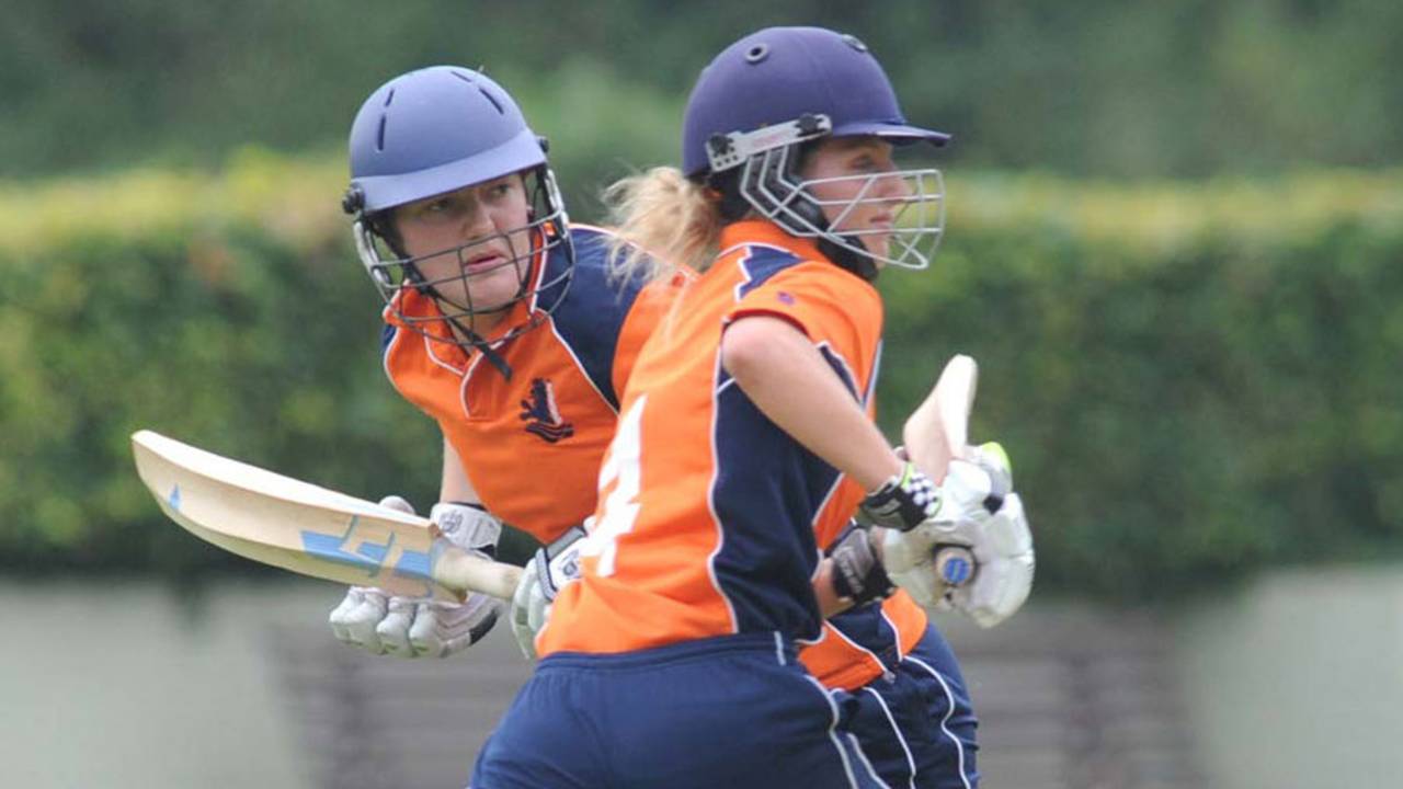Miranda Veringmeier and Denise Hannema run between the wickets, Netherlands Women v Thailand Women, ICC Women's World T20 qualifiers, Group A, July 25, 2013