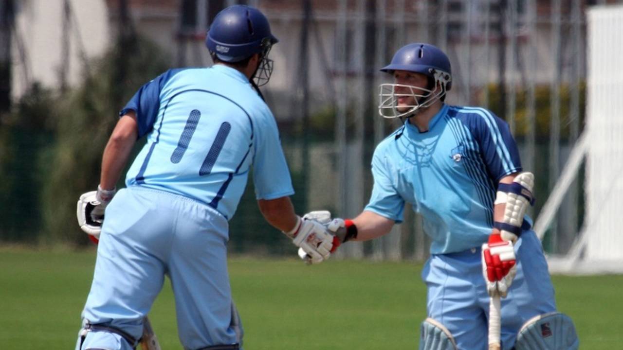 Pablo Ferguson is congratulated after reaching his fifty, Argentina v Vanuatu, ICC World Cricket League Division Six, St Clement, July 22, 2013