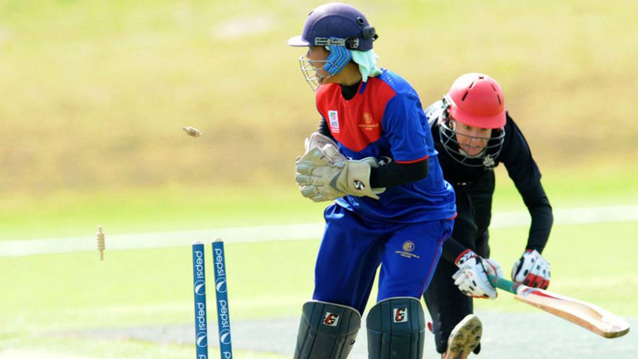 Thailand wicketkeeper Pundarika Prathanmitr runs out Canada's Sheryl Tittlemier, Thailand v Canada, Women's World Twenty20 Qualifier, 2nd shield semi-final, Dublin, July 30, 2013