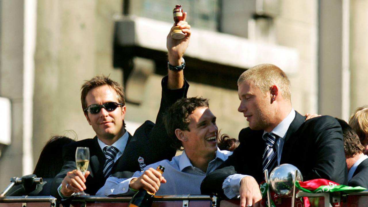 Michael Vaughan, Gary Pratt and Andrew Flintoff ride on top of the bus in the victory parade