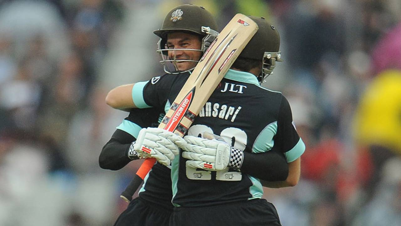 Zafar Ansari and Zander de Bruyn embrace after victory is sealed, Hampshire v Surrey, Friends Life t20, semi-final. Edgbaston, August 17, 2013