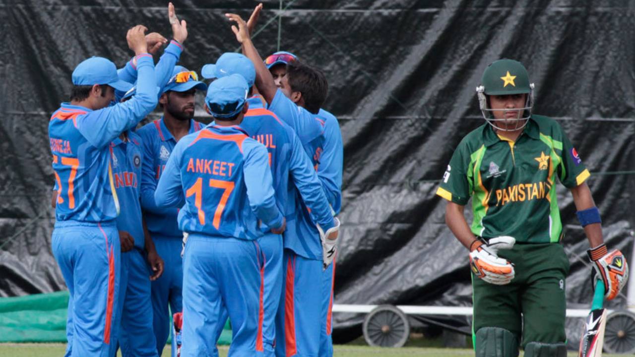 The Indian players celebrate the wicket of Babar Azam, India Under-23 v Pakistan Under-23, Group A, Asian Cricket Council Emerging Teams Cup, Singapore, August 18, 2013
