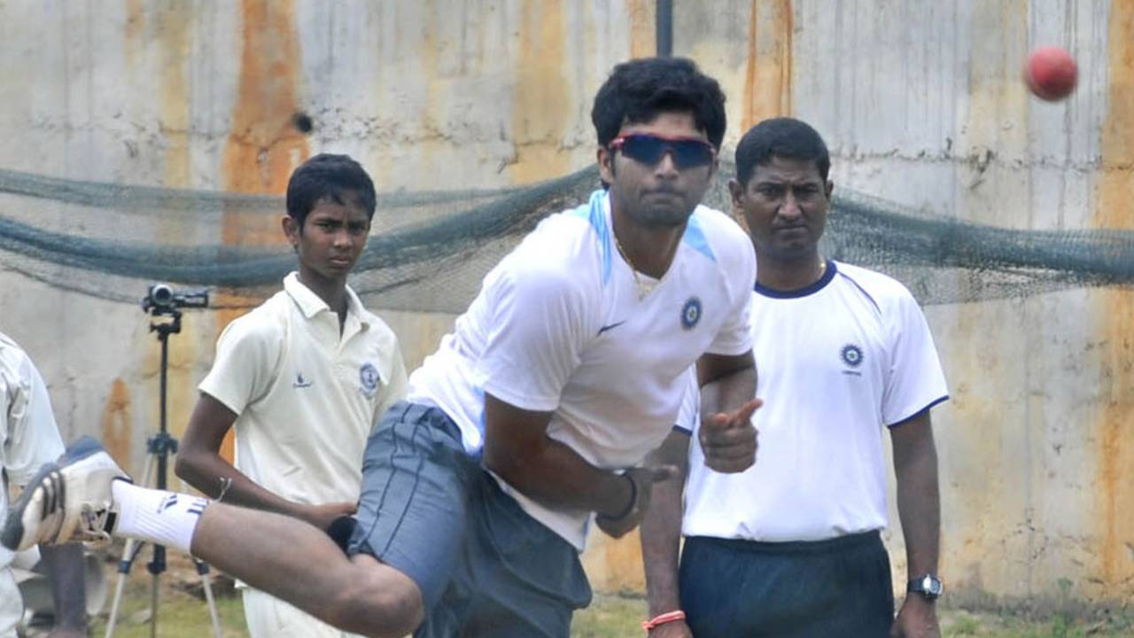 Jalaj Saxena in his delivery stride at the India A nets, Visakhapatnam, August 27, 2013