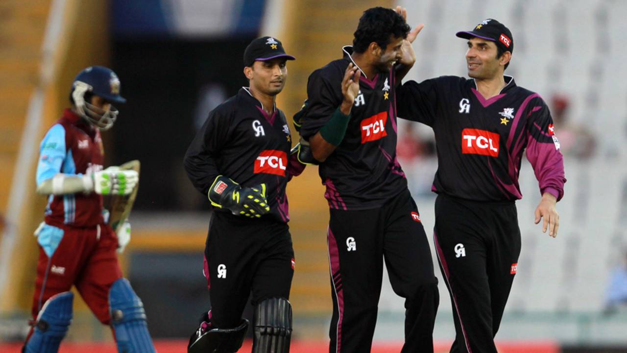 Ehsan Adil picked up three wickets in an economic spell, Faisalabad Wolves v Kandurata Maroons, Champions League Qualifiers, Mohali, September 20, 2013