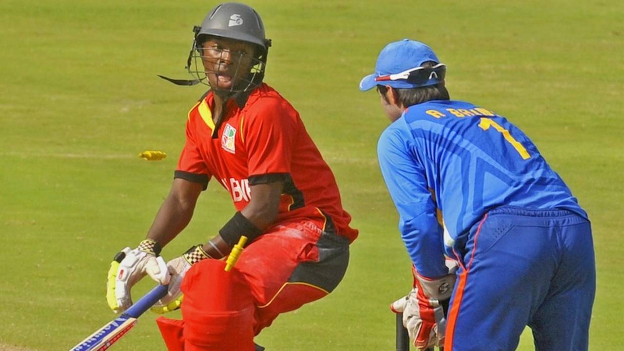 Shoun Handirisi is stumped by Ankush Bains, India Under-19s v Zimbabwe Under-19s, Visakhapatnam, Sep 23, 2013